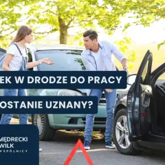 Dwie osoby rozmawiają przy uszkodzonych samochodach po wypadku drogowym.